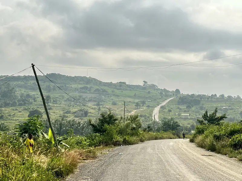 Paved access road through the valley